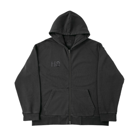 Black Harry Styles zip up hoodie with subtle HS logo embroidery in luxury minimalist streetwear front view